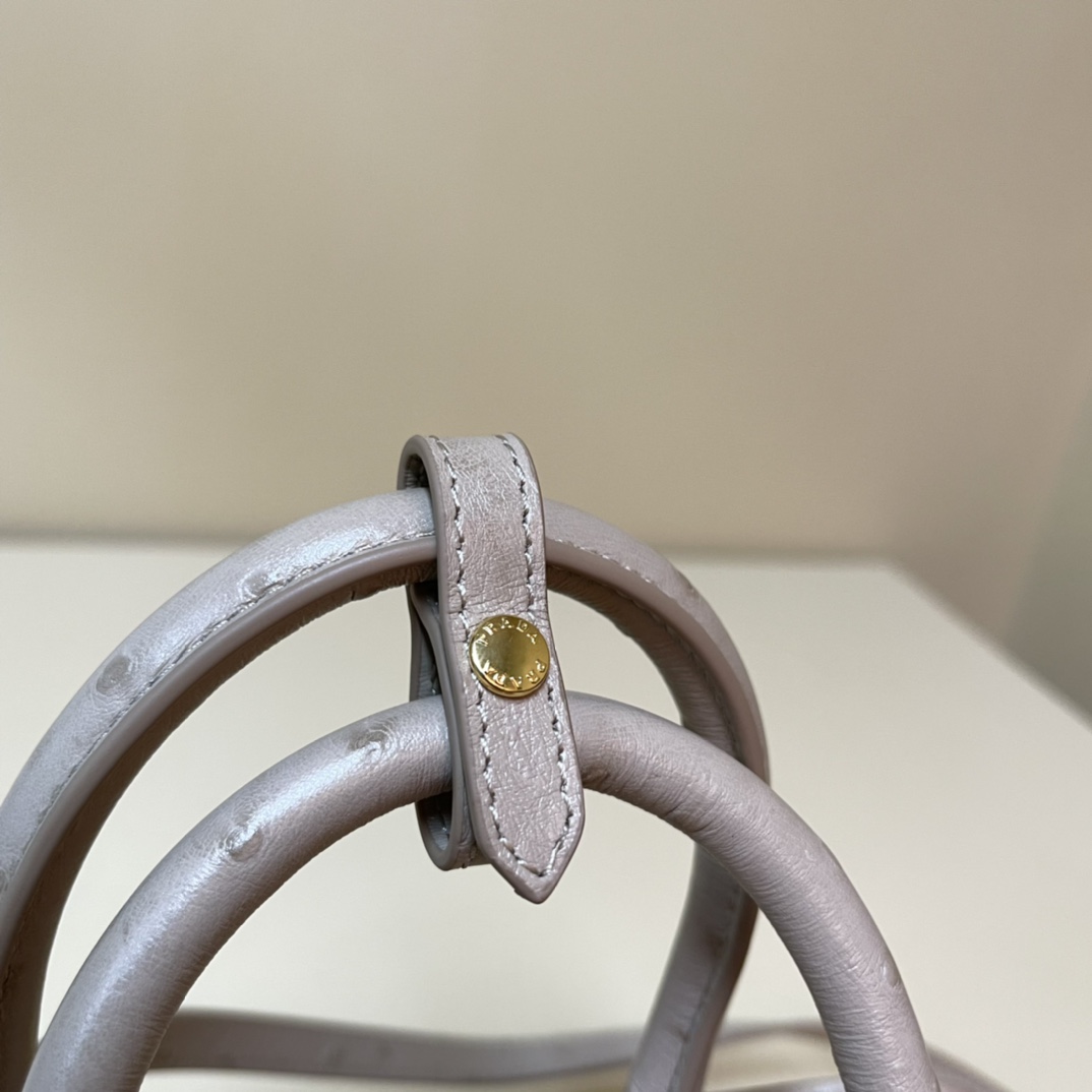 Pra*a re-nylon and leather two-handle bag
