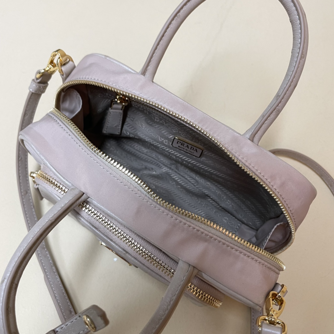 Pra*a re-nylon and leather two-handle bag