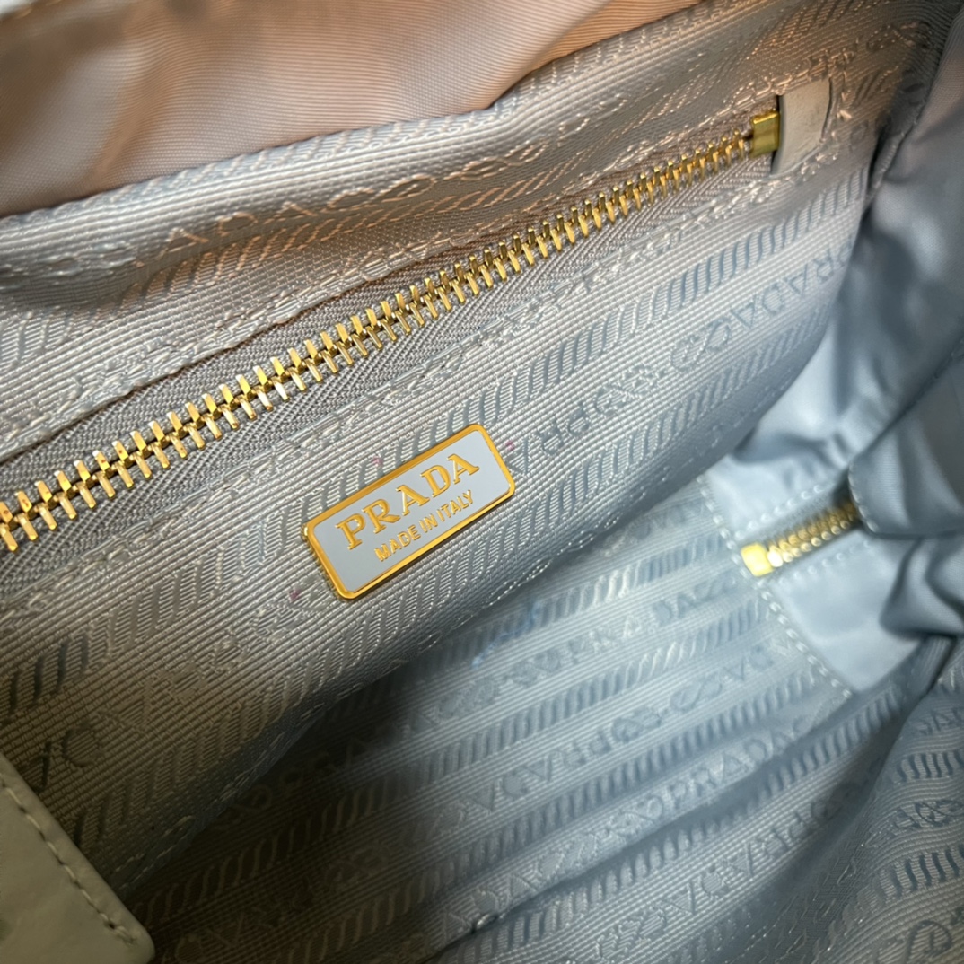 Pra*a re-nylon and leather two-handle bag
