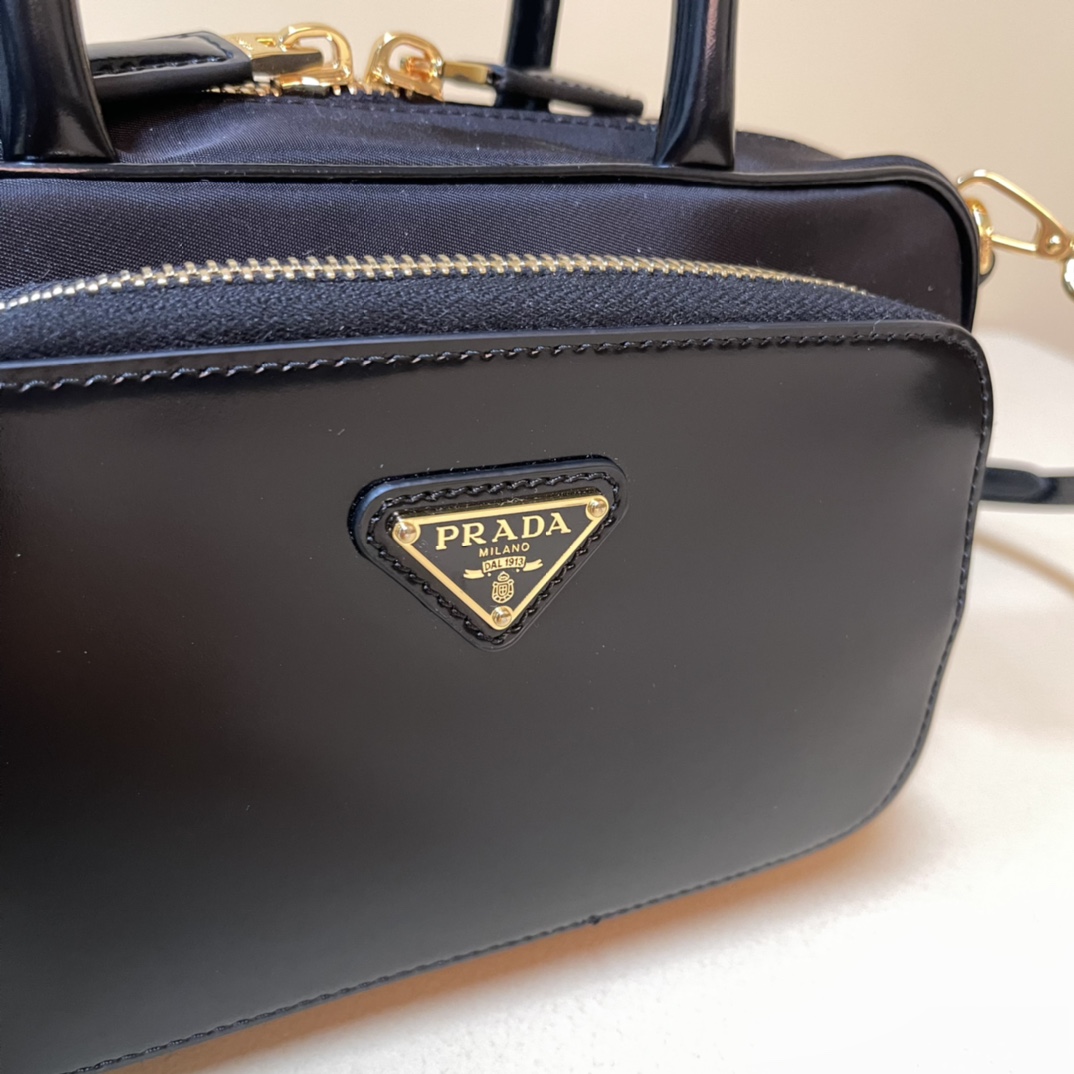 Pra*a re-nylon and leather two-handle bag