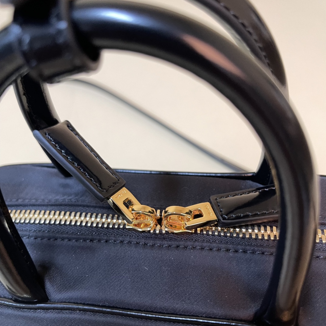 Pra*a re-nylon and leather two-handle bag