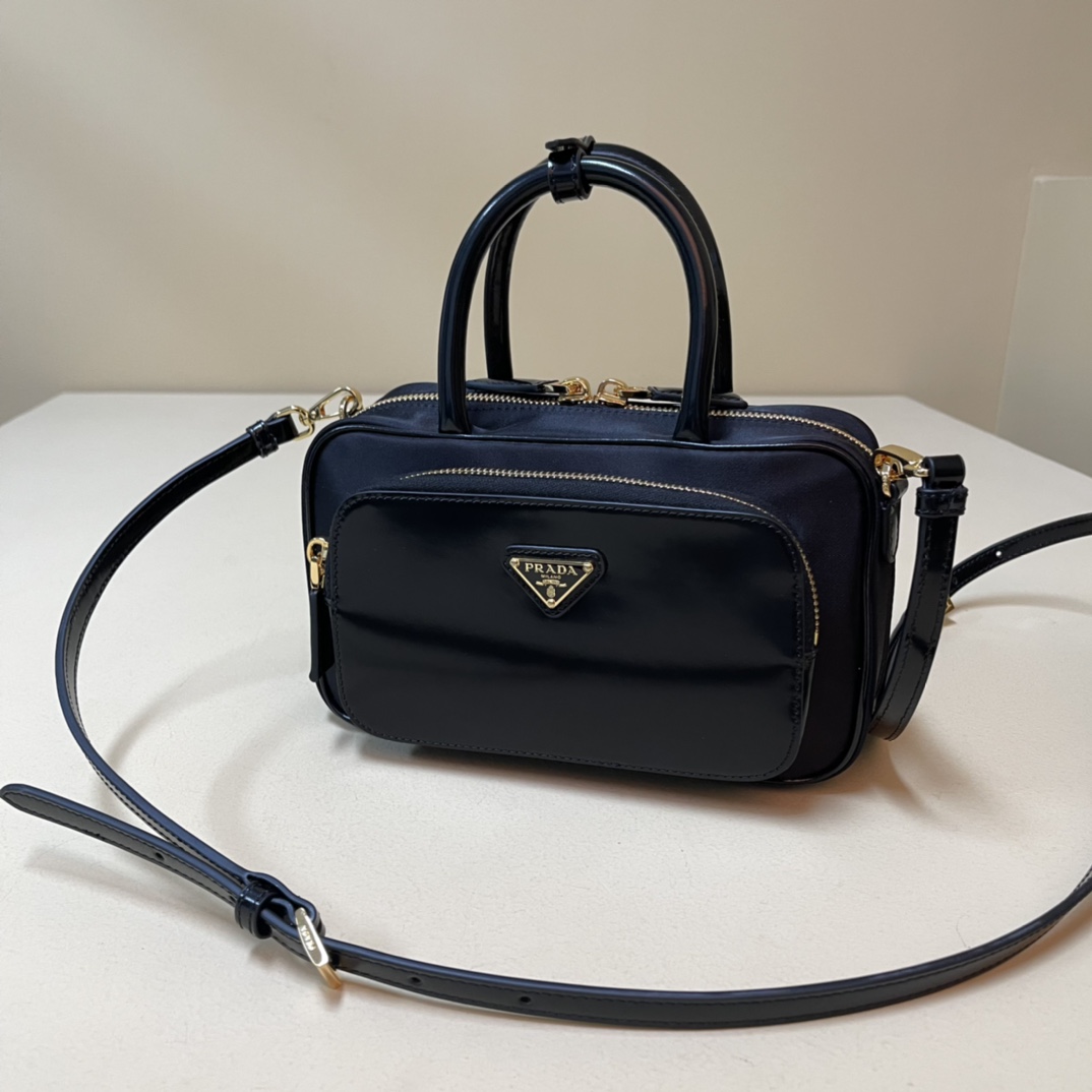 Pra*a re-nylon and leather two-handle bag
