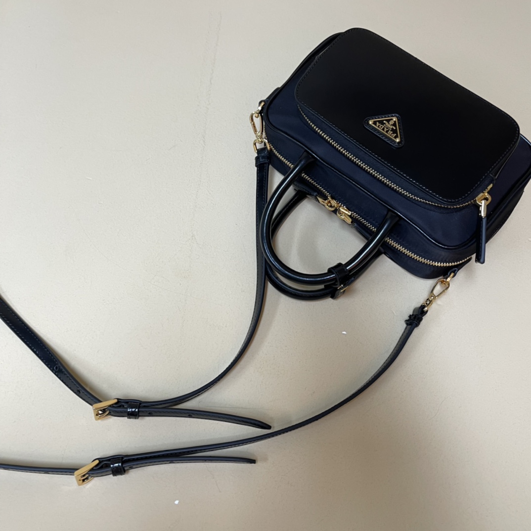 Pra*a re-nylon and leather two-handle bag