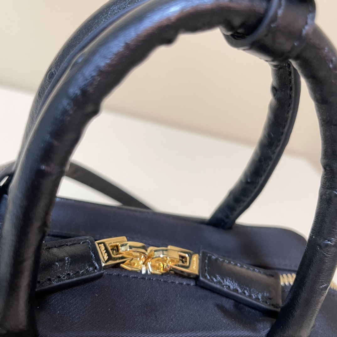 Pra*a re-nylon and leather two-handle bag