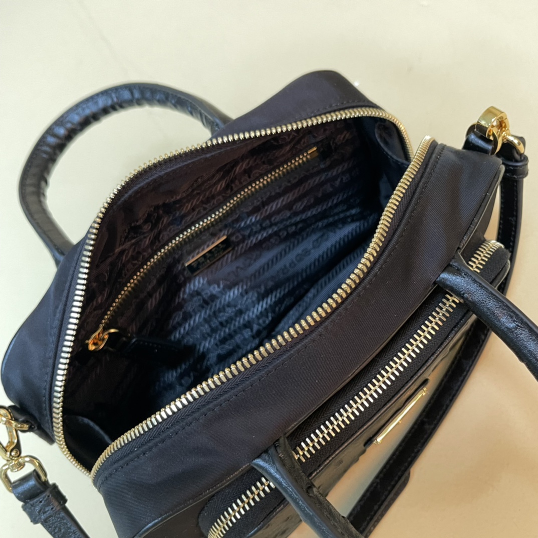 Pra*a re-nylon and leather two-handle bag