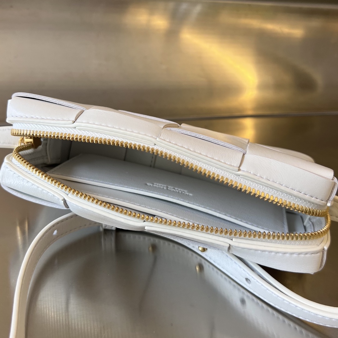 bo*te*ga Ve*ne*ta mini cassette cross-body bag