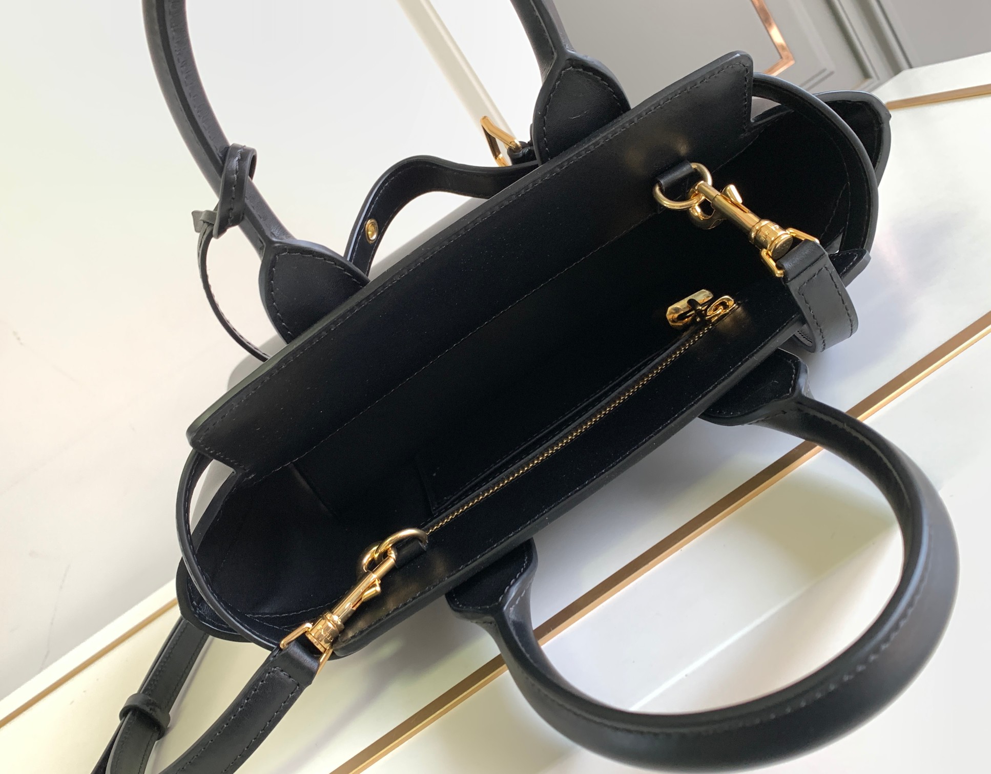Ce**e teen Ce**e conti bag in natural calfskin