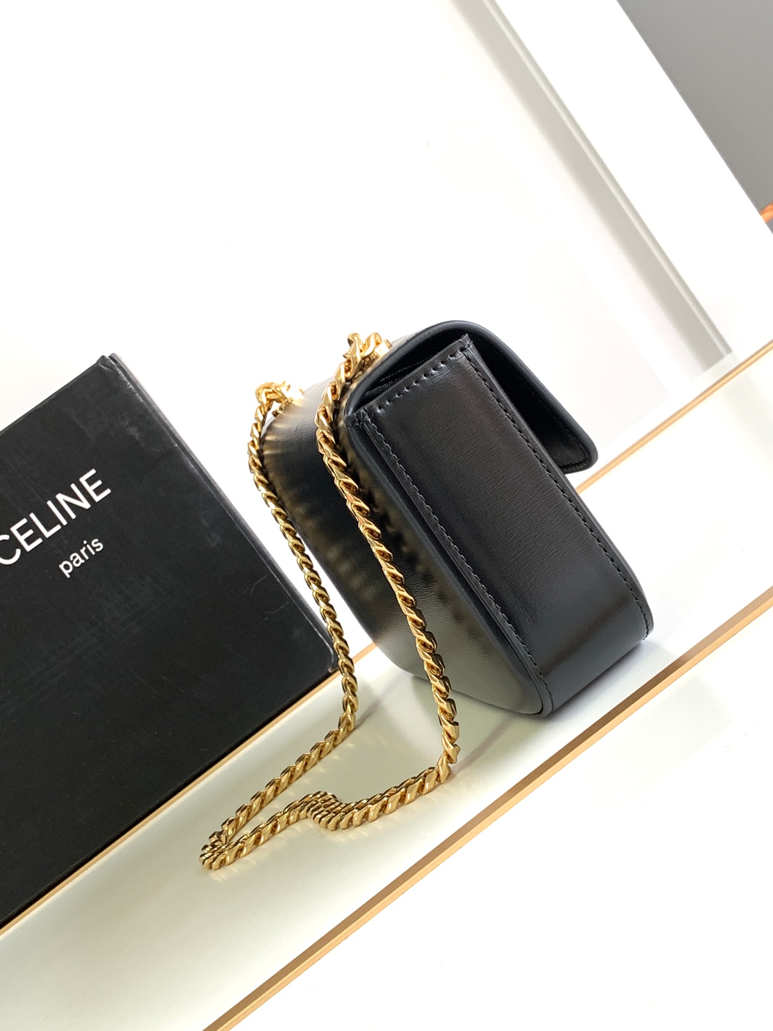 Ce**e chain shoulder bag claude