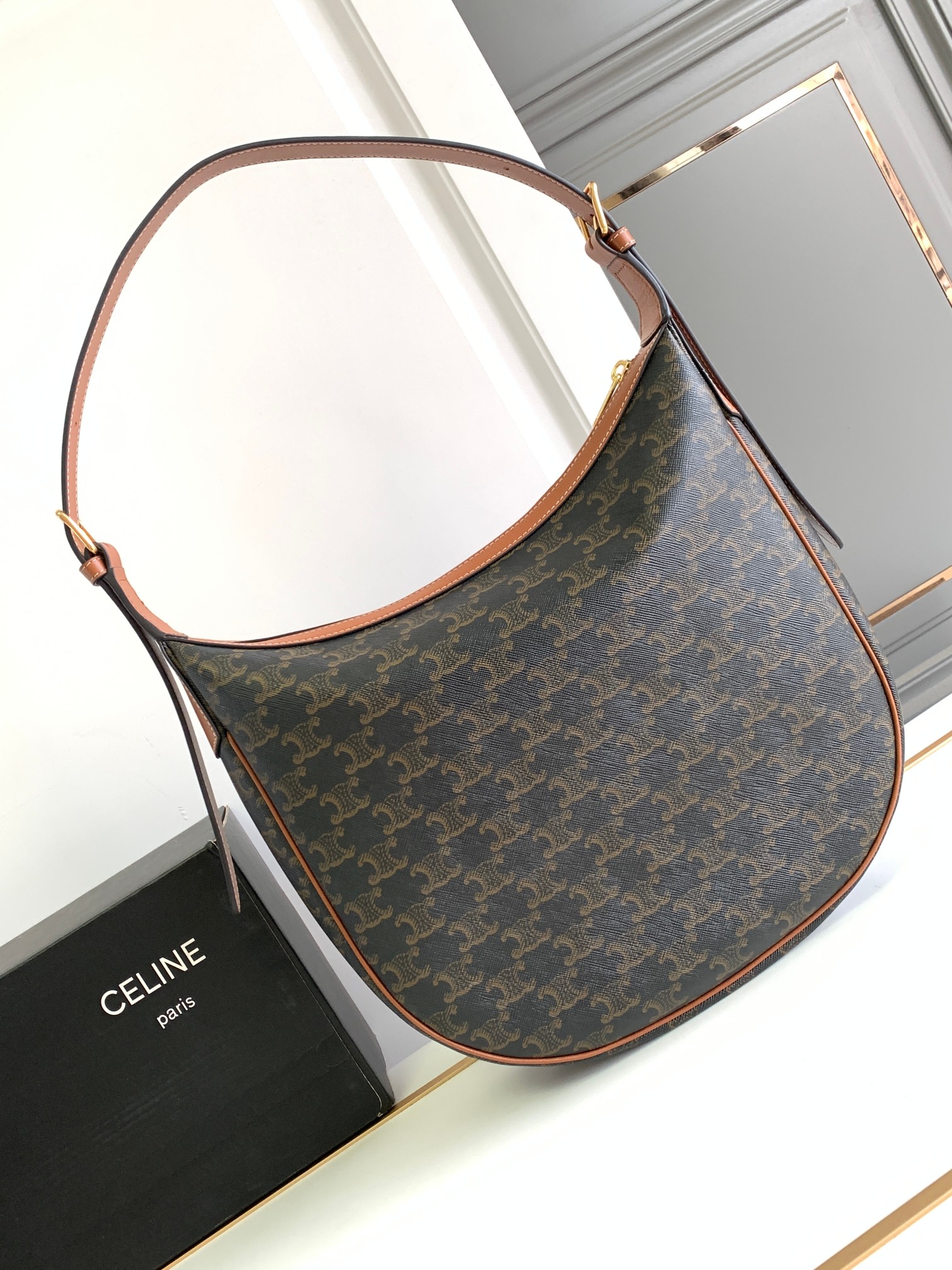 Ce**e heloise bag in triomphe canvas and calfskin tan