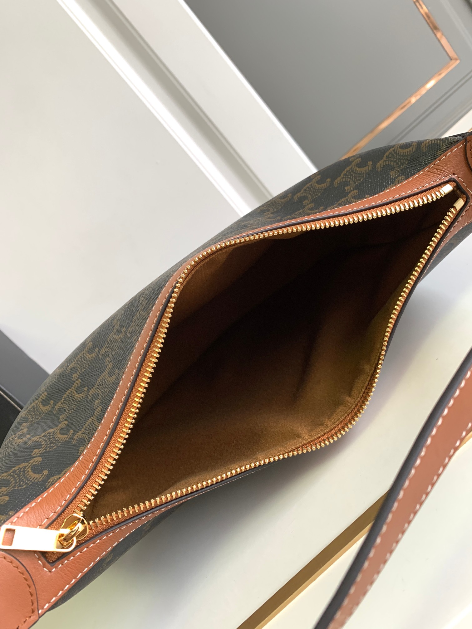 Ce**e heloise bag in triomphe canvas and calfskin tan