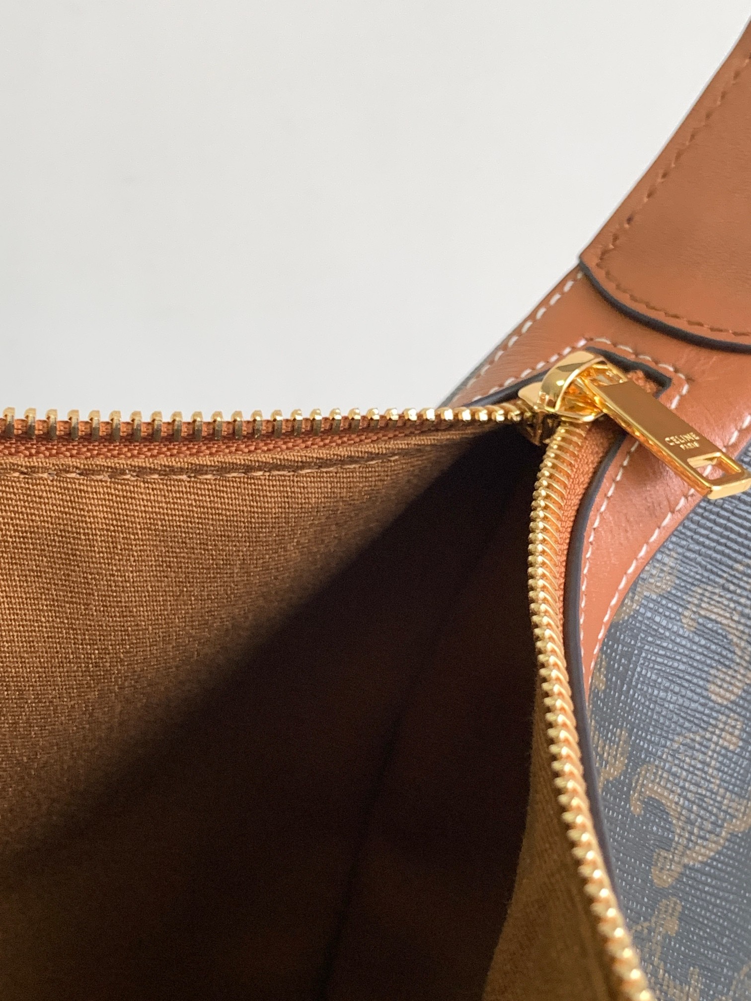 Ce**e heloise bag in triomphe canvas and calfskin tan