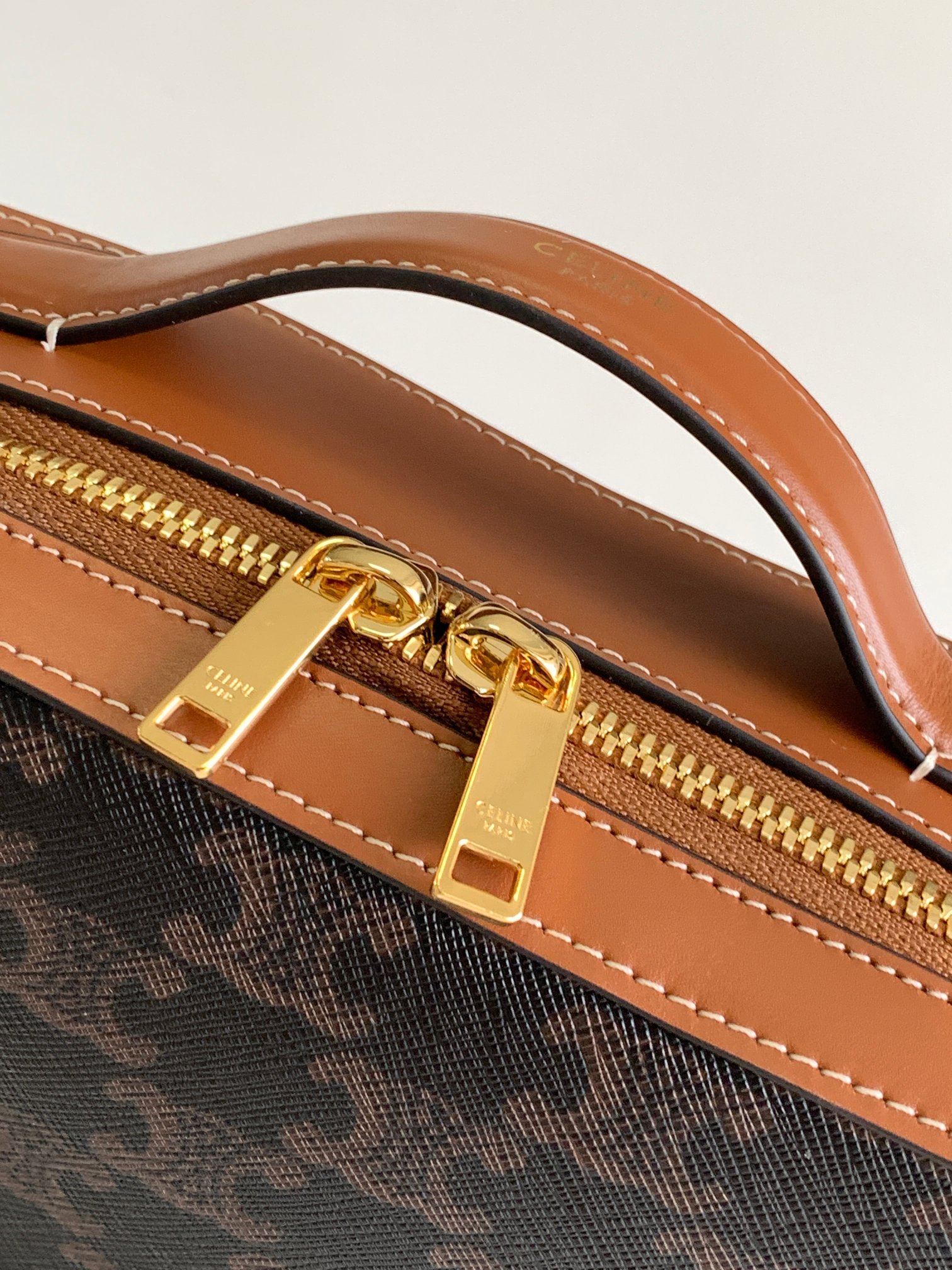 Ce**e messenger box in triomphe canvas and calfskin