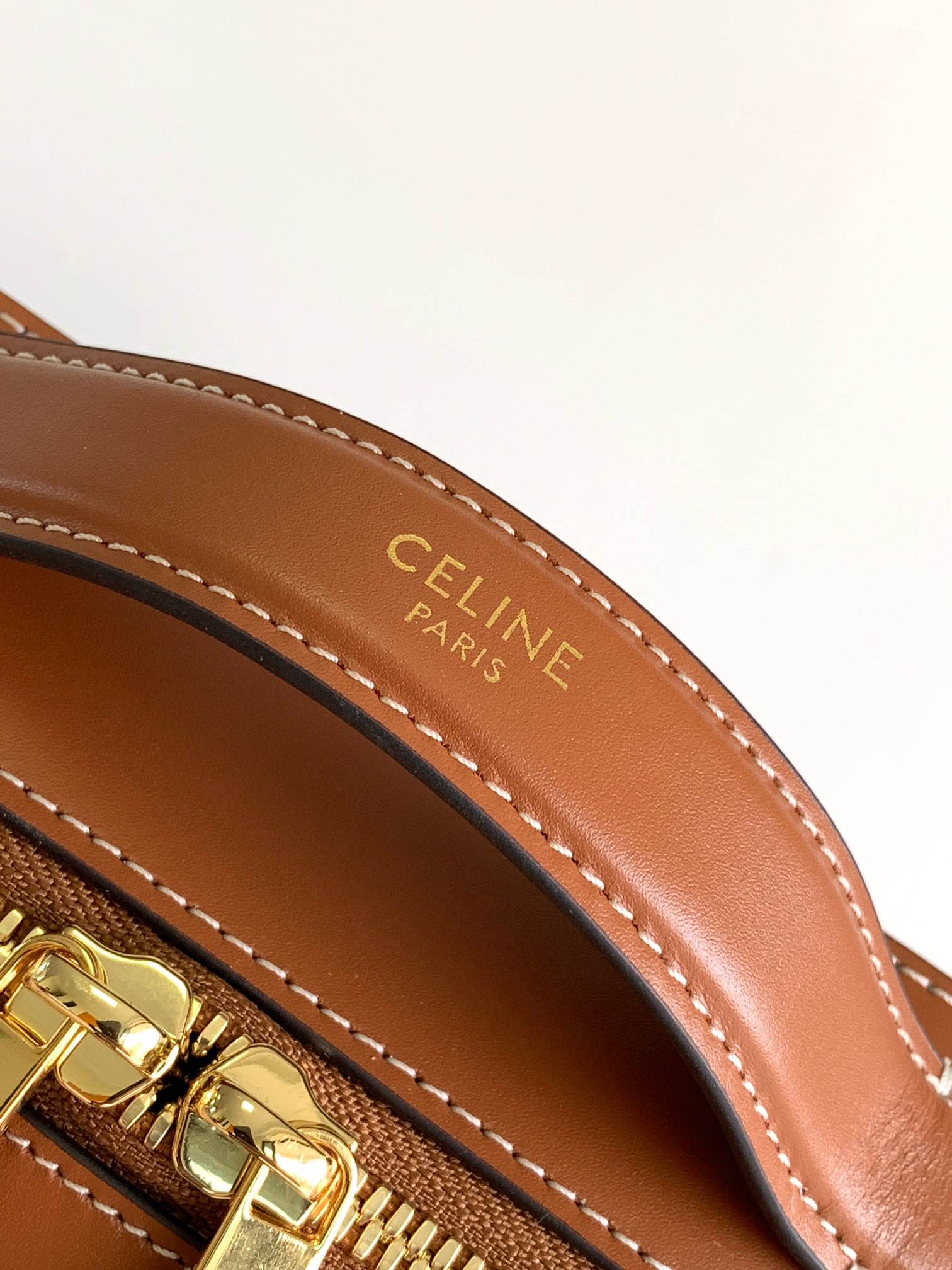 Ce**e messenger box in triomphe canvas and calfskin