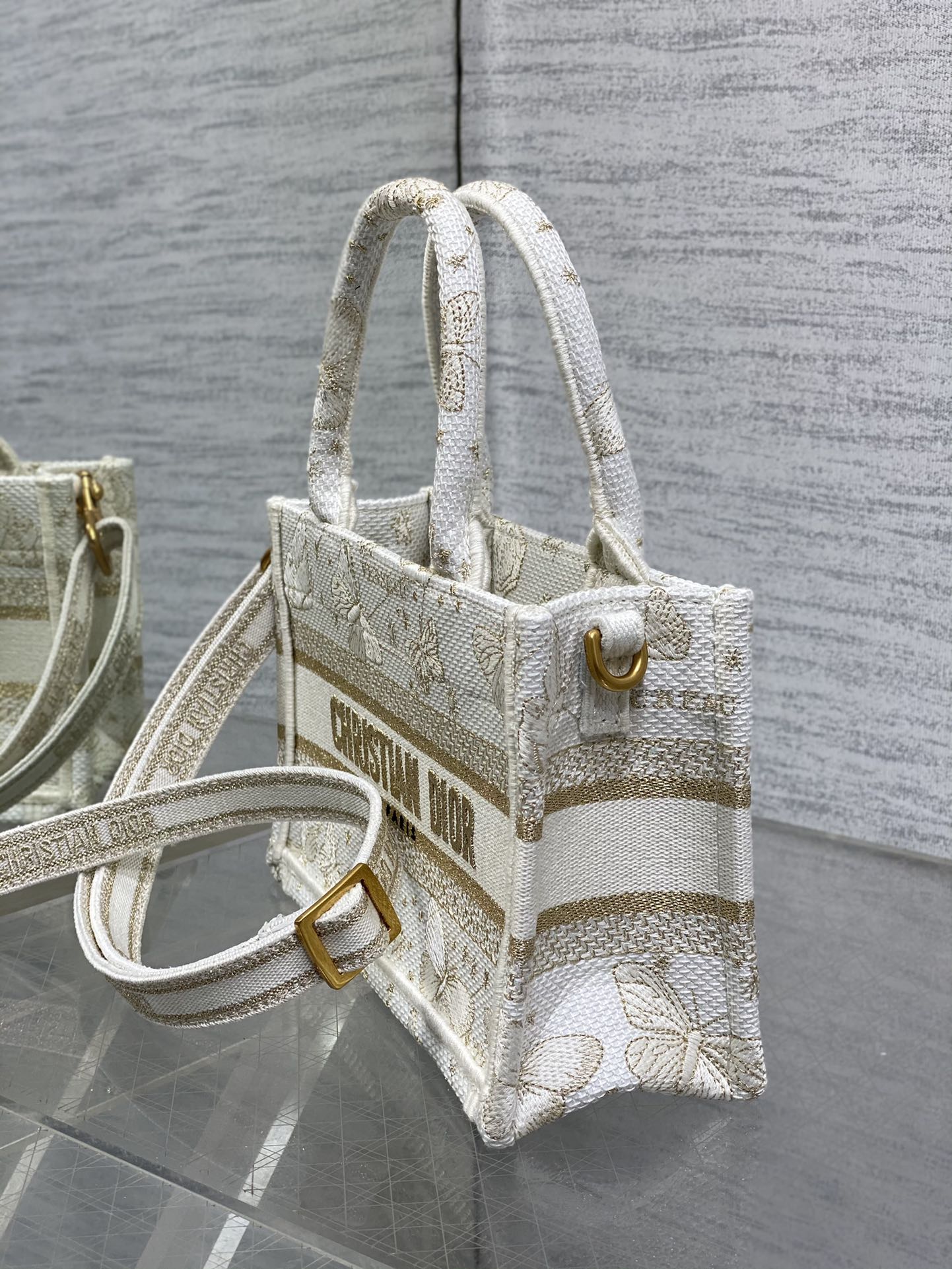 mini D*or book tote with strap