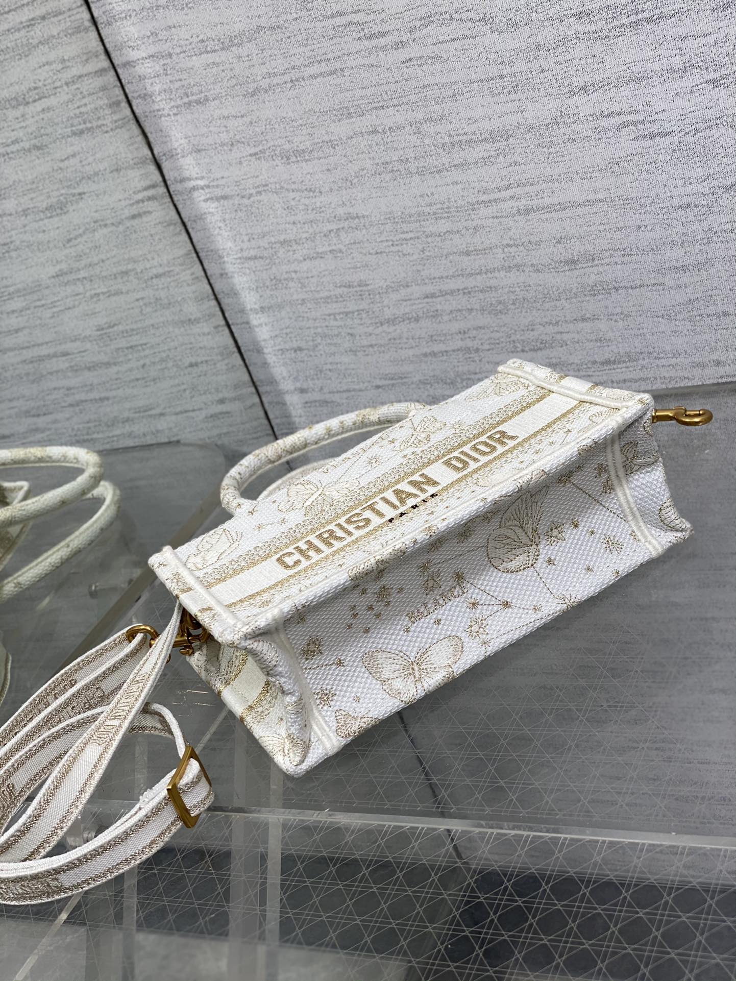 mini D*or book tote with strap