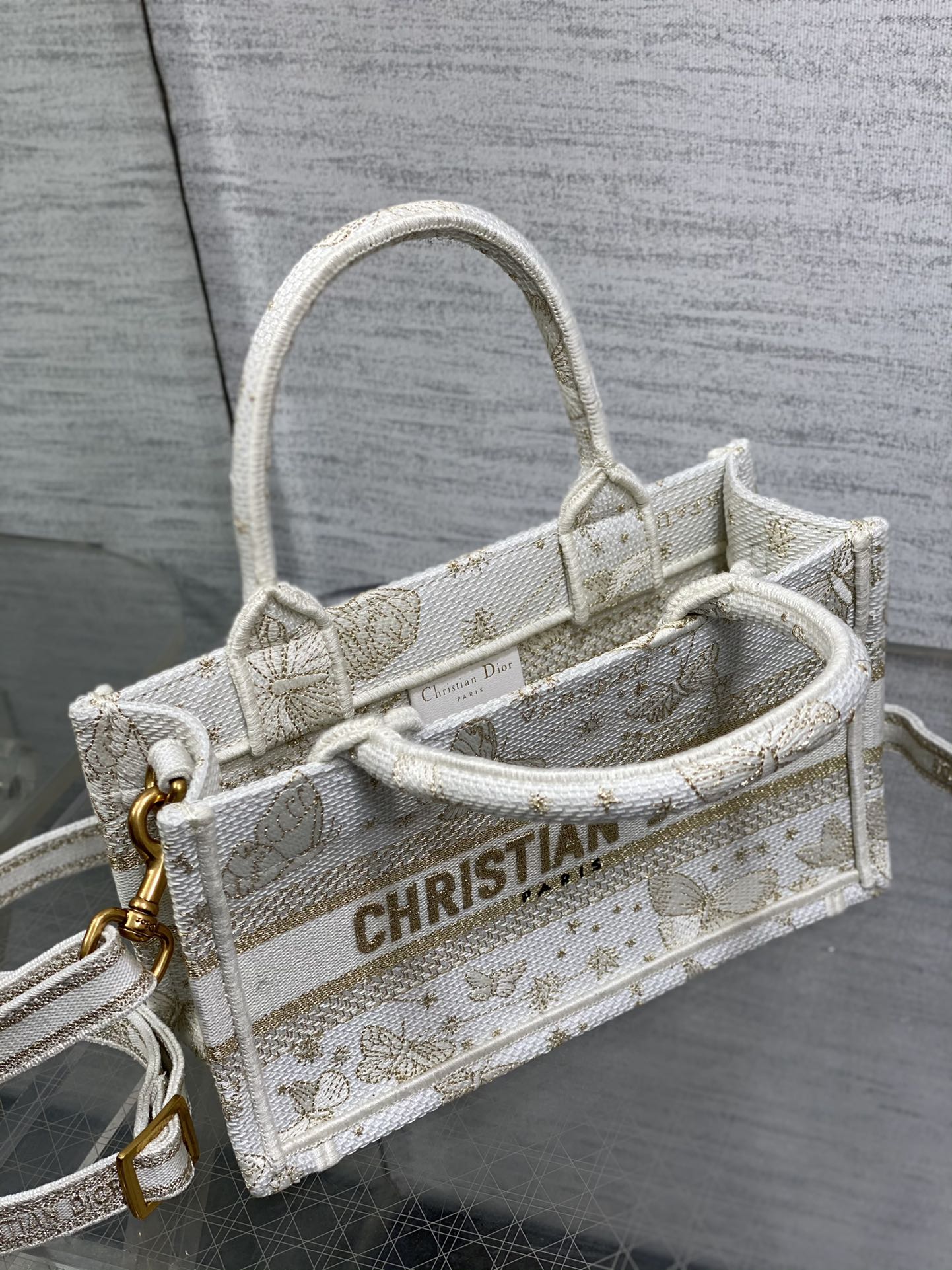 mini D*or book tote with strap