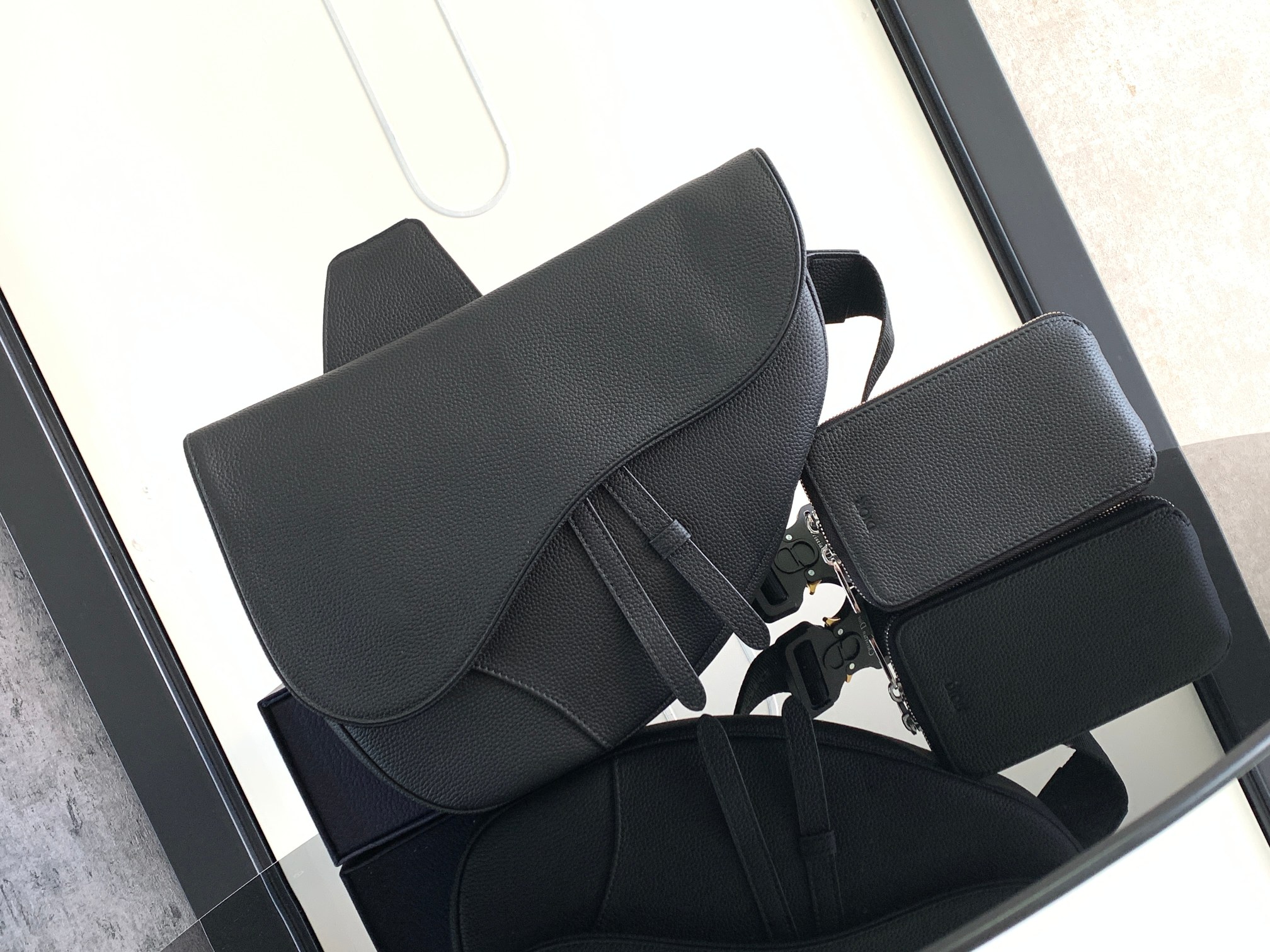 D*or saddle leather bag