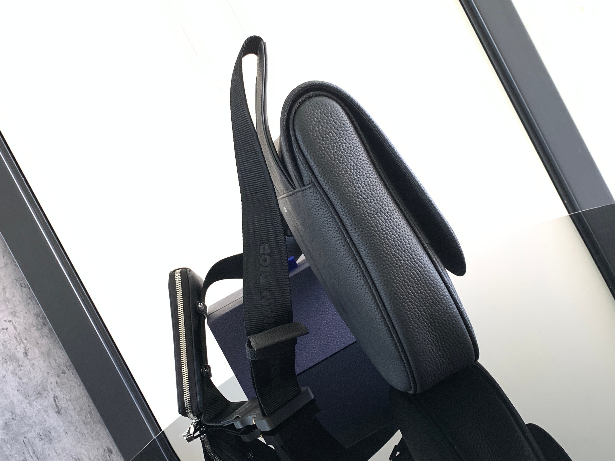 D*or saddle leather bag