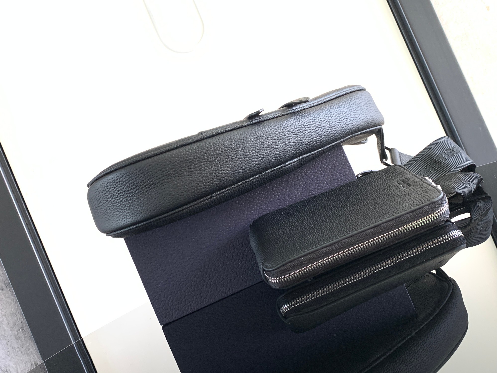 D*or saddle leather bag