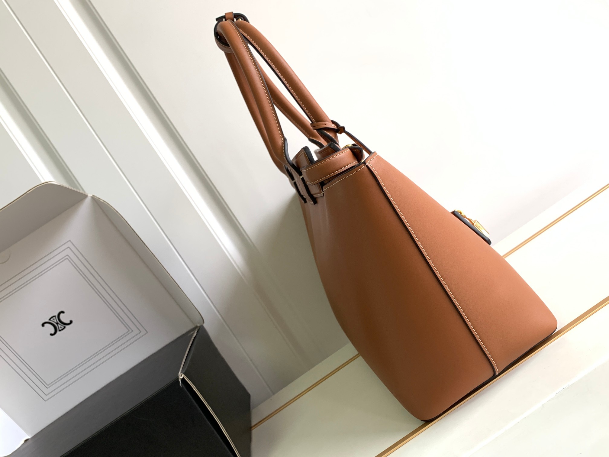 ce**e conti bag in S*pple calfskin