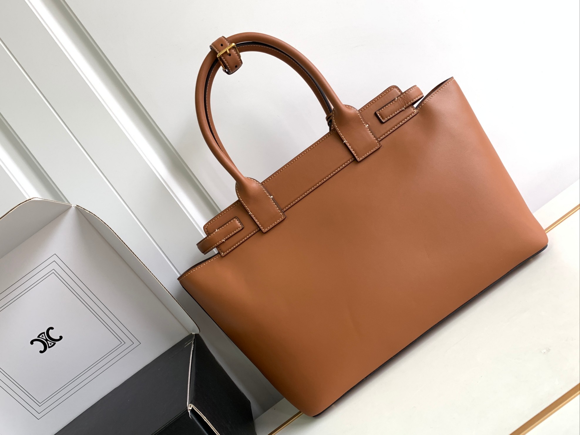ce**e conti bag in S*pple calfskin