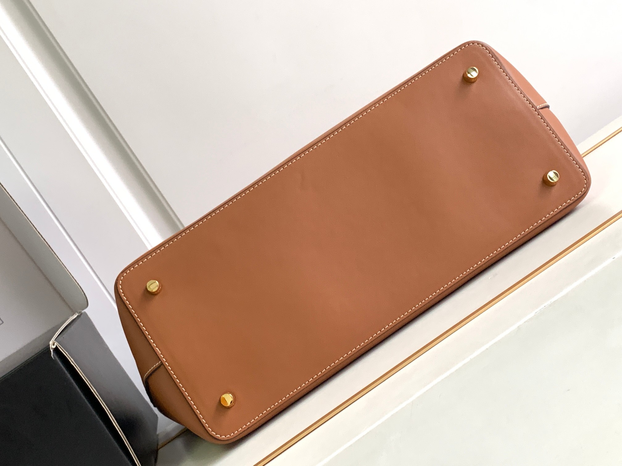 ce**e conti bag in S*pple calfskin