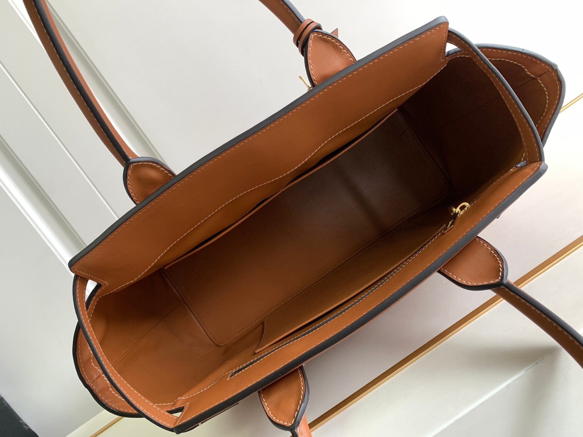ce**e conti bag in S*pple calfskin