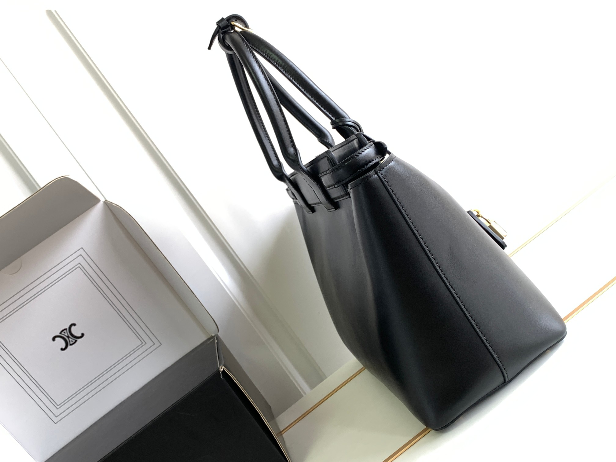 ce**e conti bag in S*pple calfskin