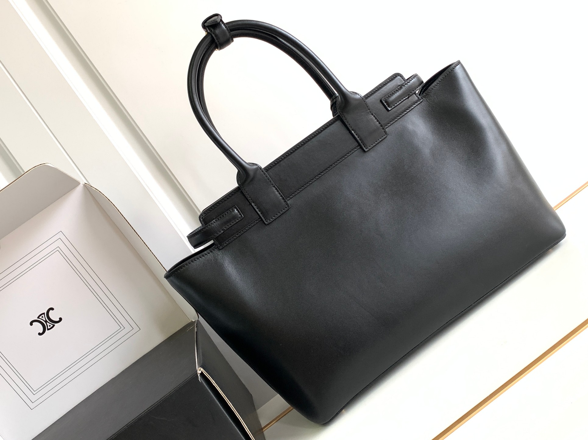 ce**e conti bag in S*pple calfskin