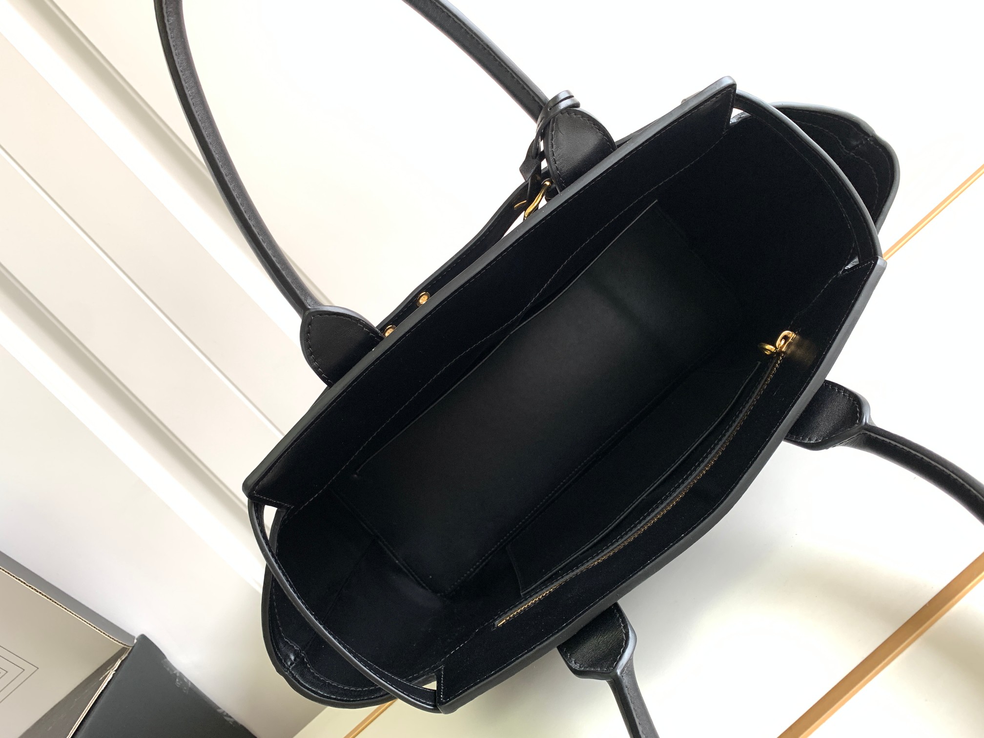 ce**e conti bag in S*pple calfskin