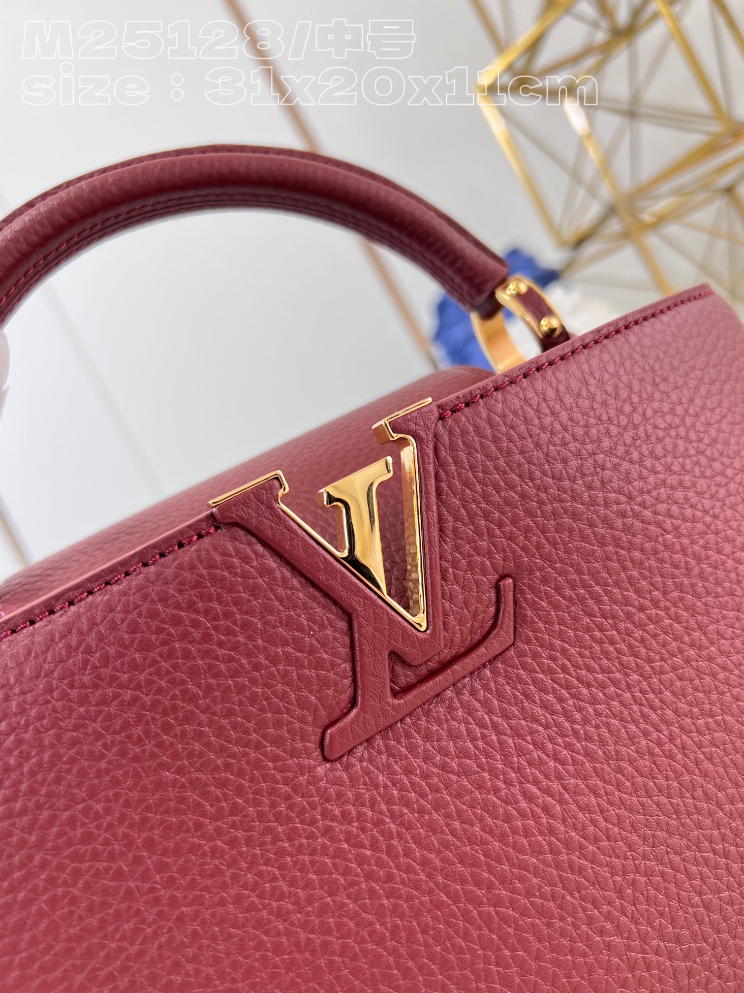 l**is V*t*n capucines medium handbag