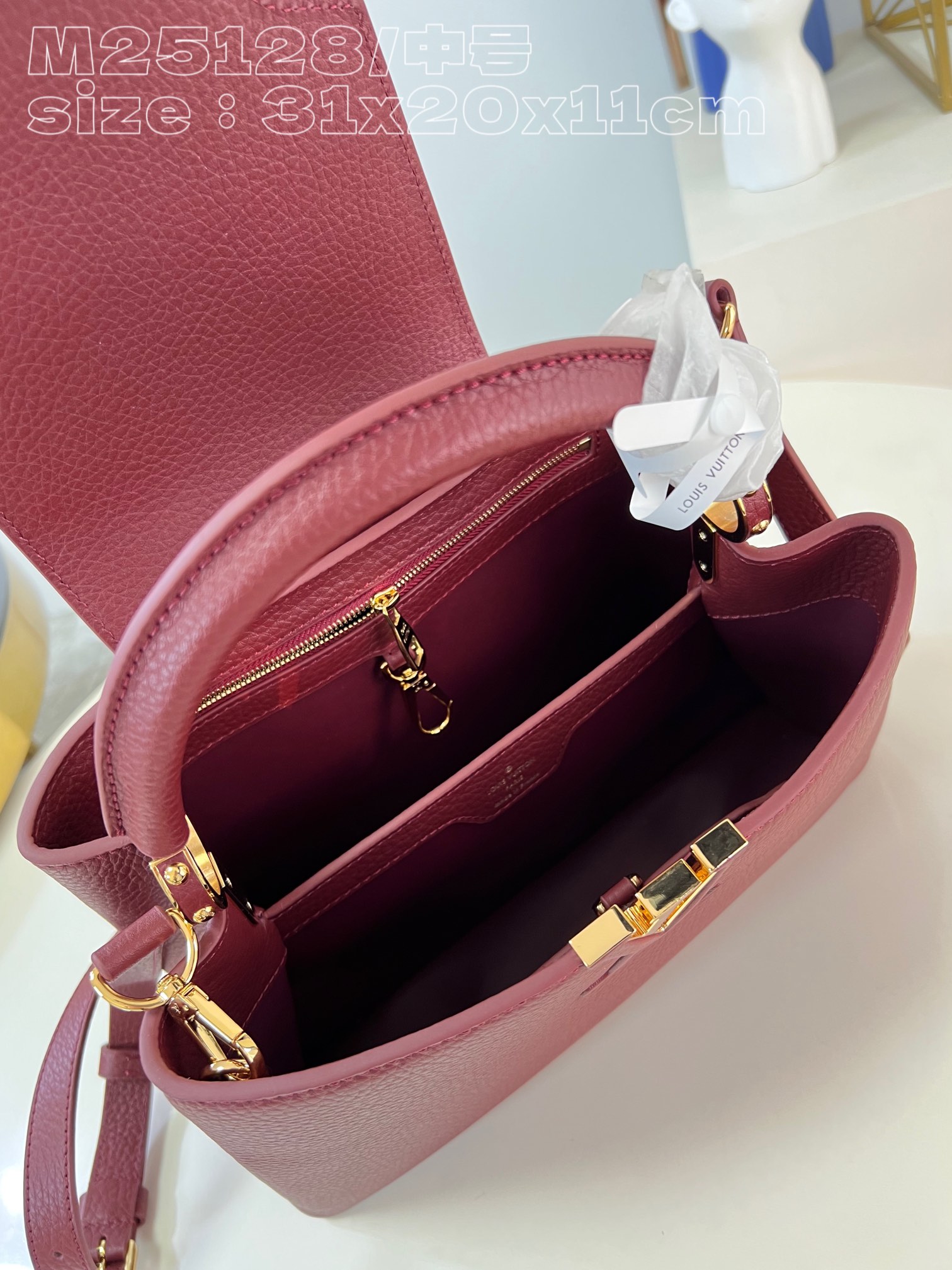 l**is V*t*n capucines medium handbag