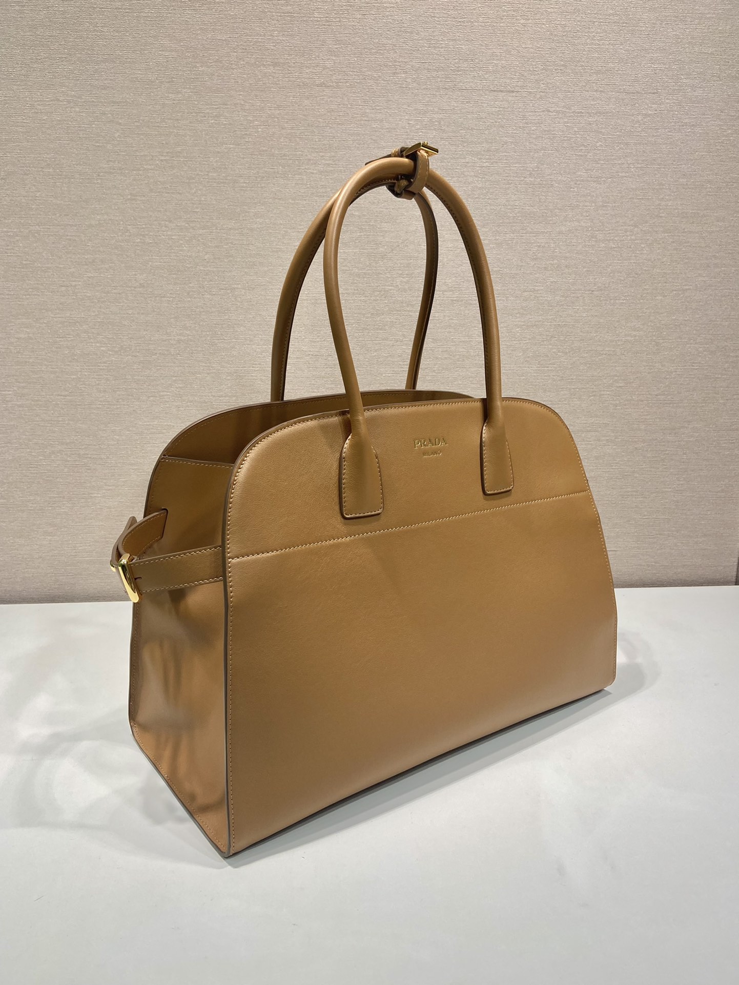 Pra*a large leather tote bag with buckles