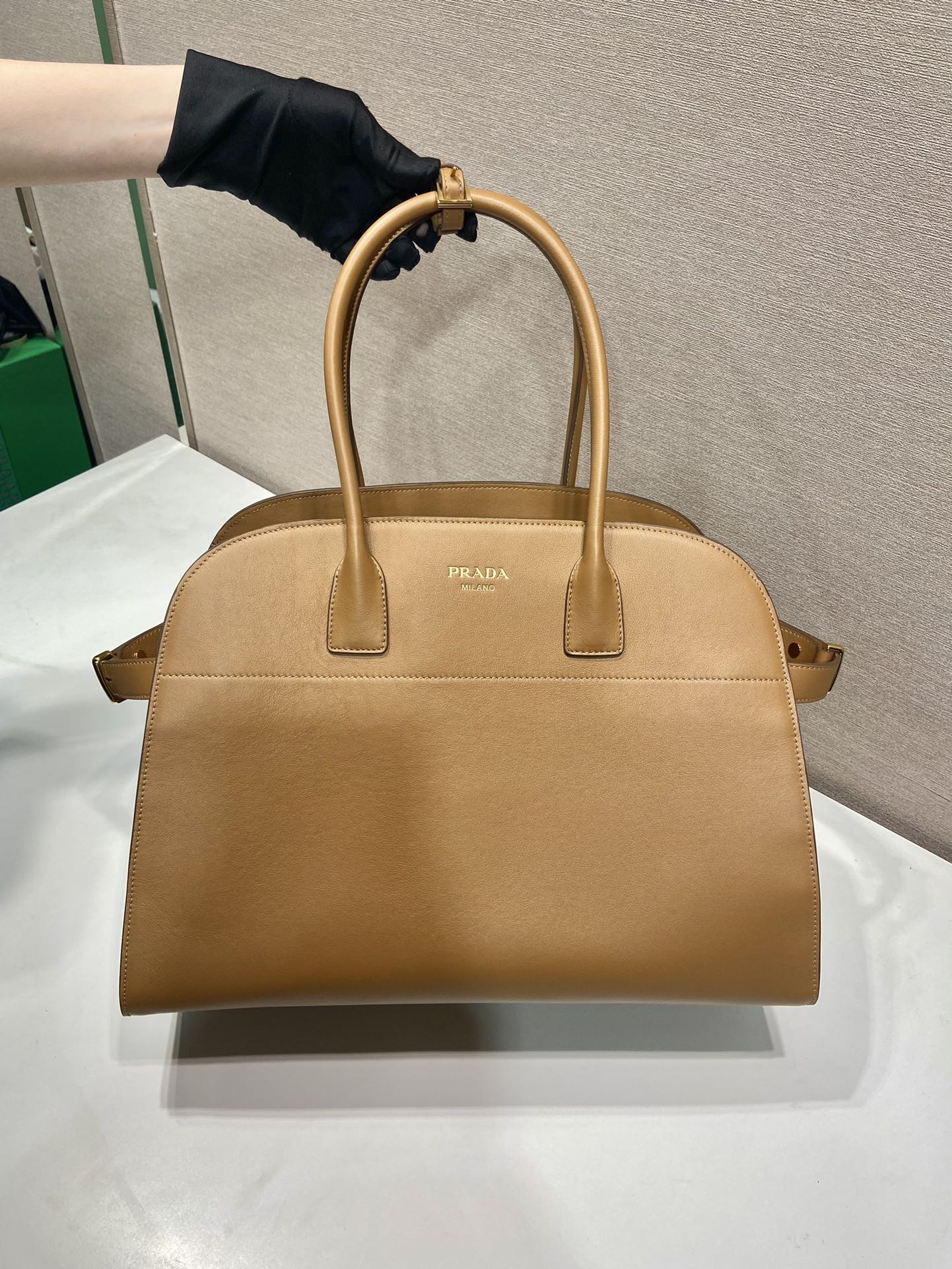 Pra*a large leather tote bag with buckles