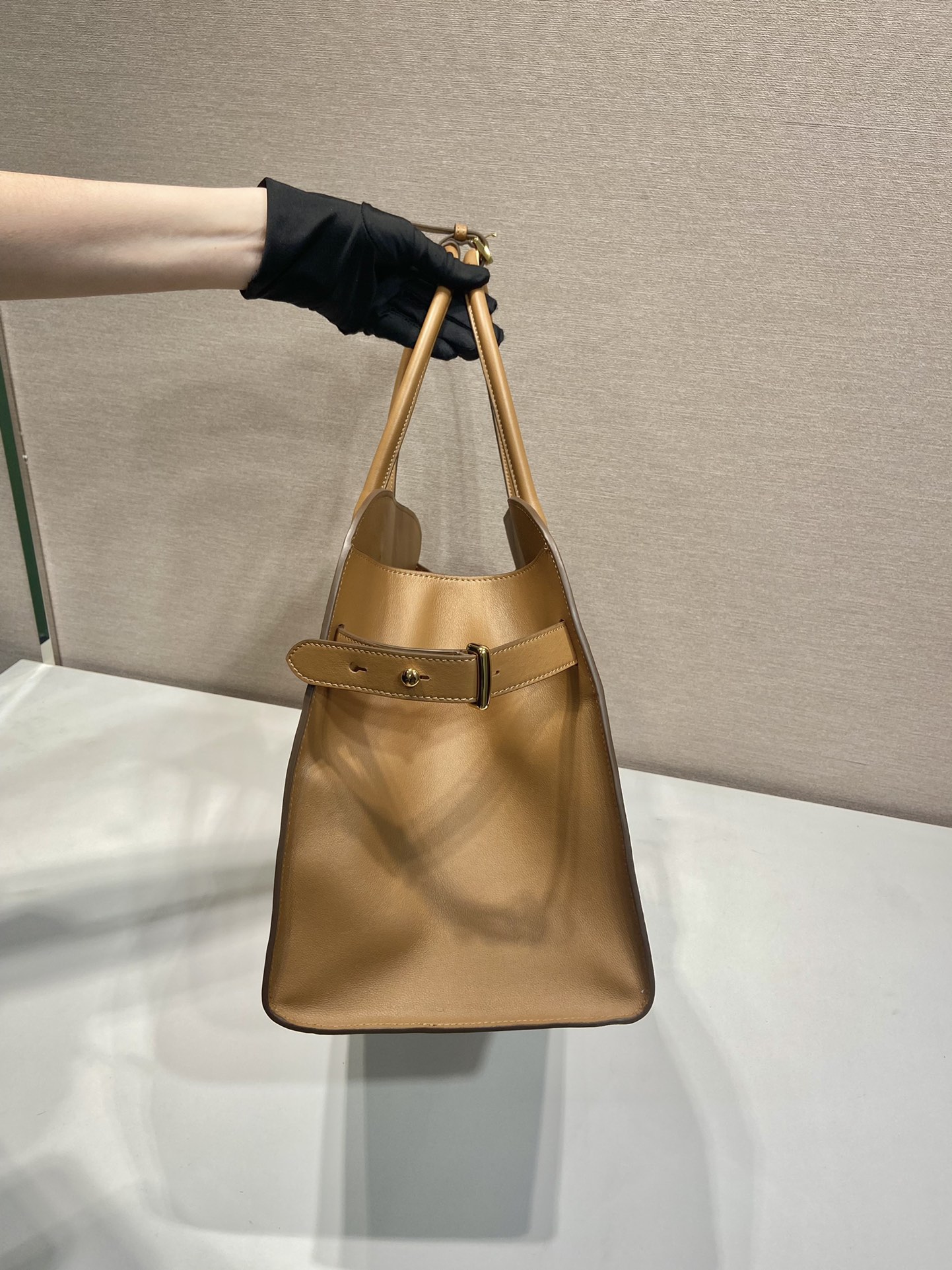 Pra*a large leather tote bag with buckles