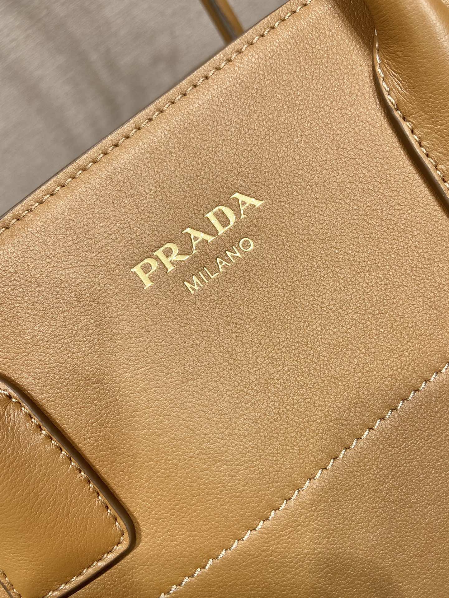 Pra*a large leather tote bag with buckles
