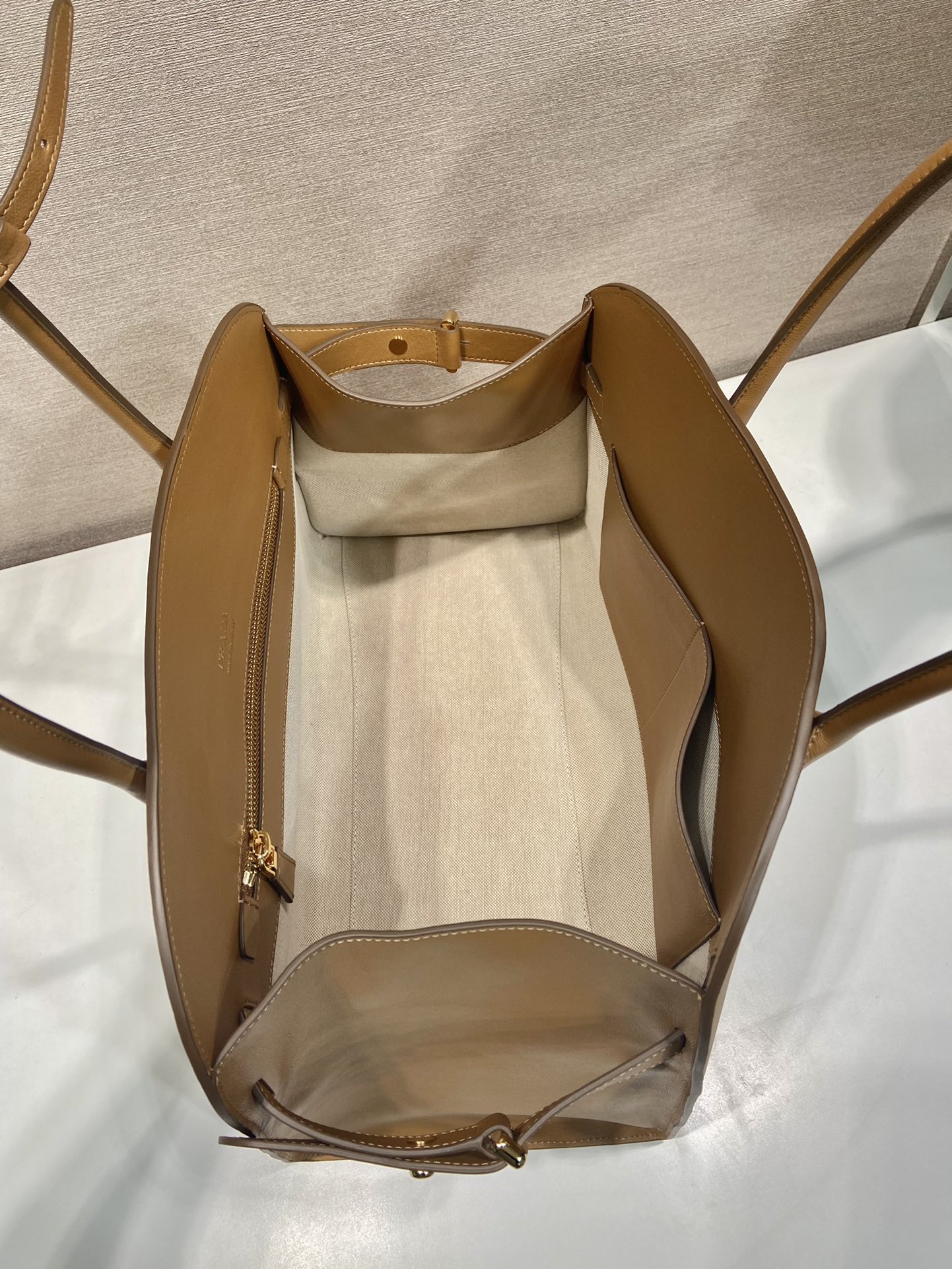 Pra*a large leather tote bag with buckles
