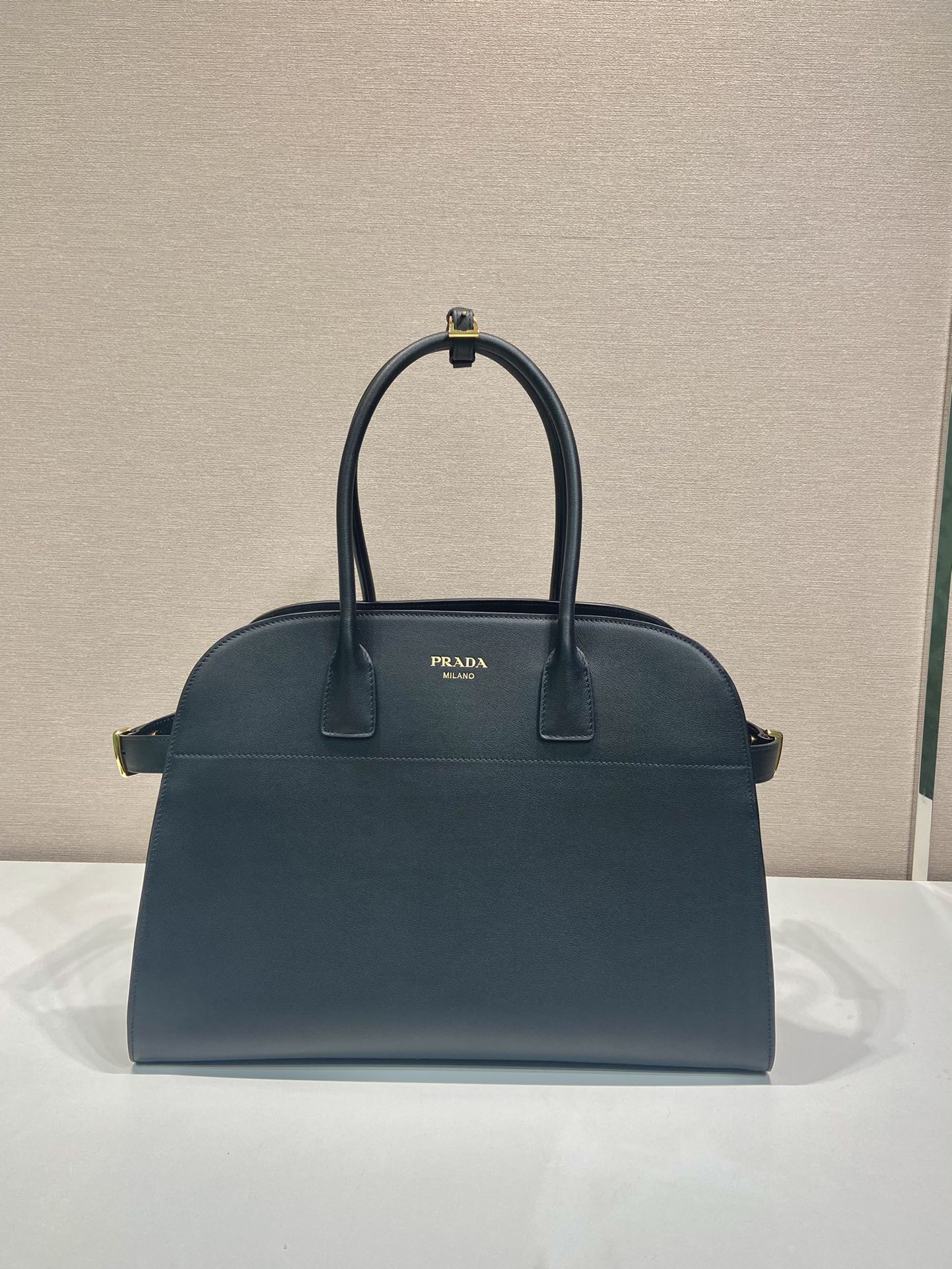 Pra*a large leather tote bag with buckles