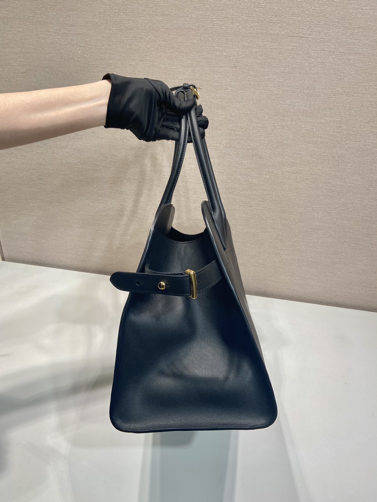 Pra*a large leather tote bag with buckles