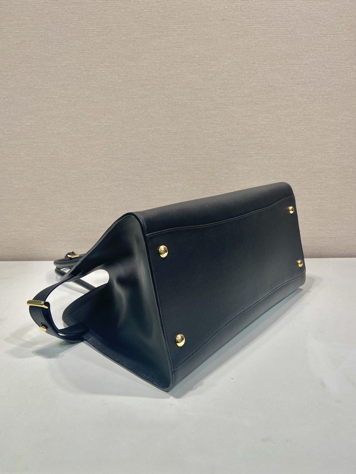 Pra*a large leather tote bag with buckles
