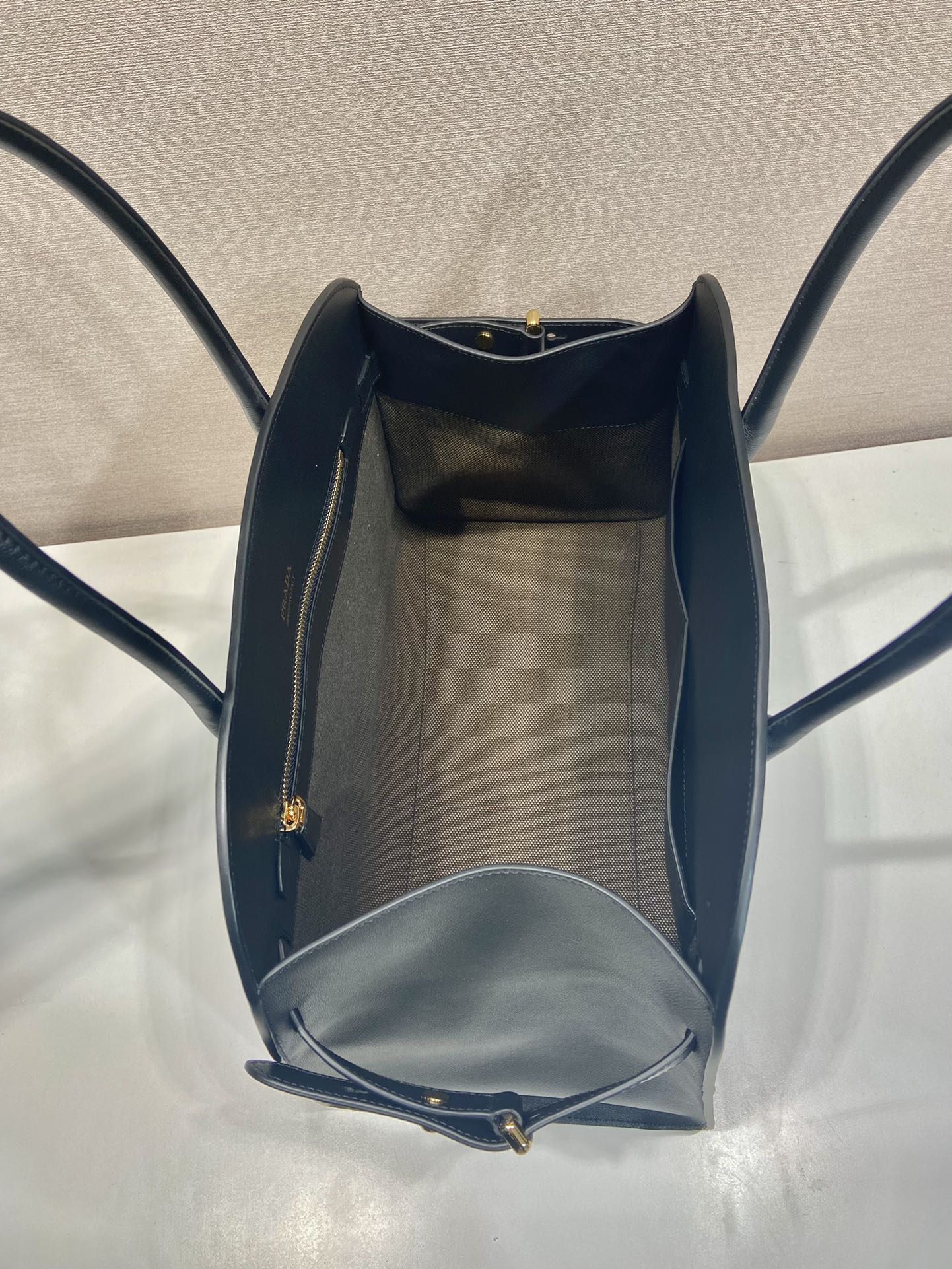 Pra*a large leather tote bag with buckles