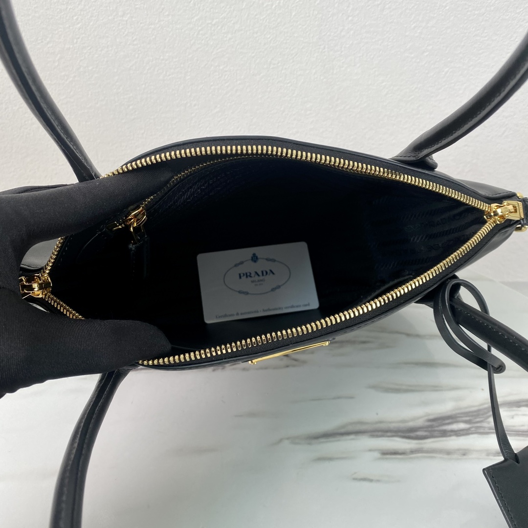Pra*a black small leather handbag