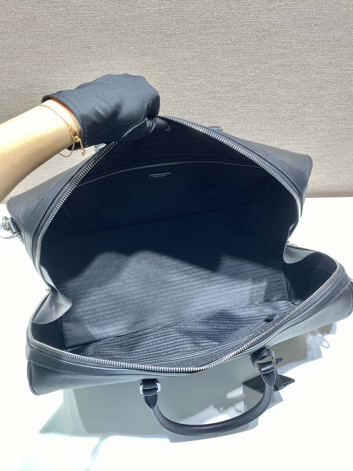 Pra*a saffiano leather travel bag