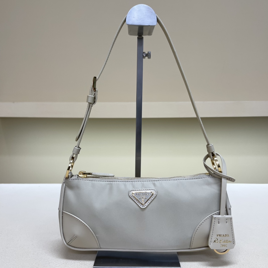 Pra*a re-edition 2002 re-nylon and brushed leather shoulder bag