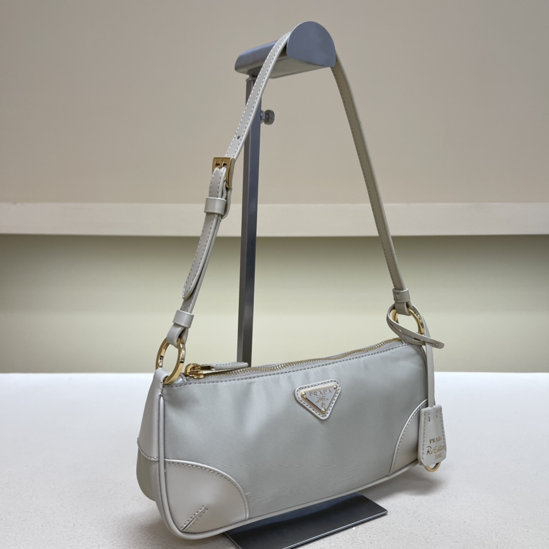 Pra*a re-edition 2002 re-nylon and brushed leather shoulder bag