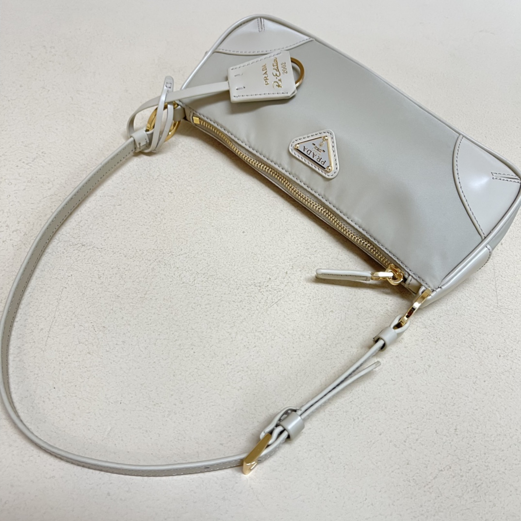 Pra*a re-edition 2002 re-nylon and brushed leather shoulder bag