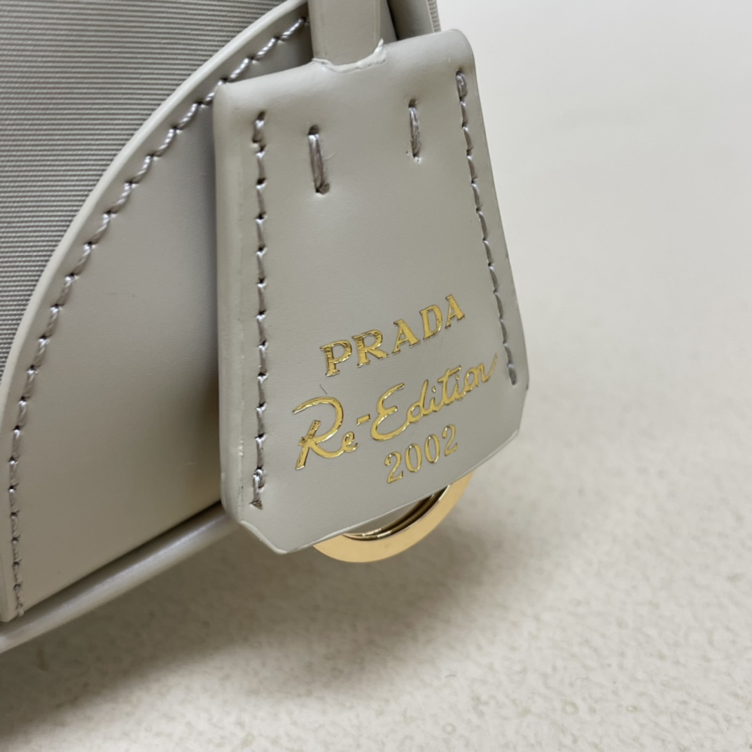 Pra*a re-edition 2002 re-nylon and brushed leather shoulder bag