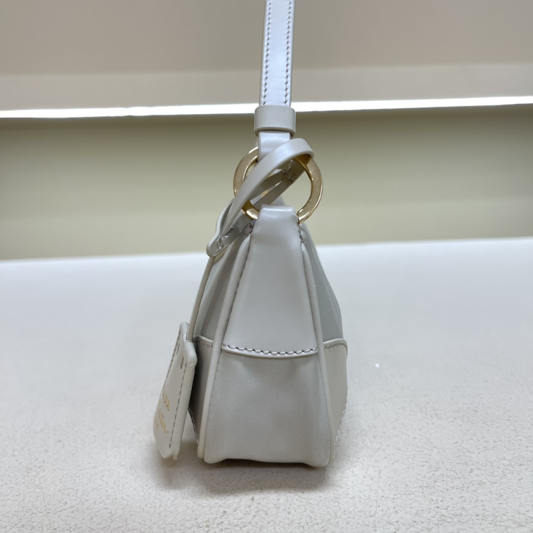 Pra*a re-edition 2002 re-nylon and brushed leather shoulder bag