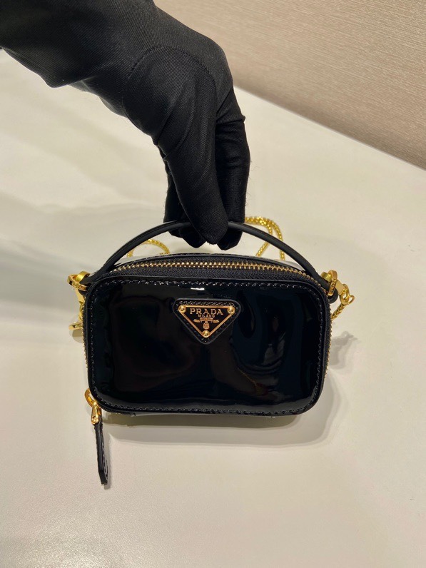 Pra*a patent leather mini-pouch