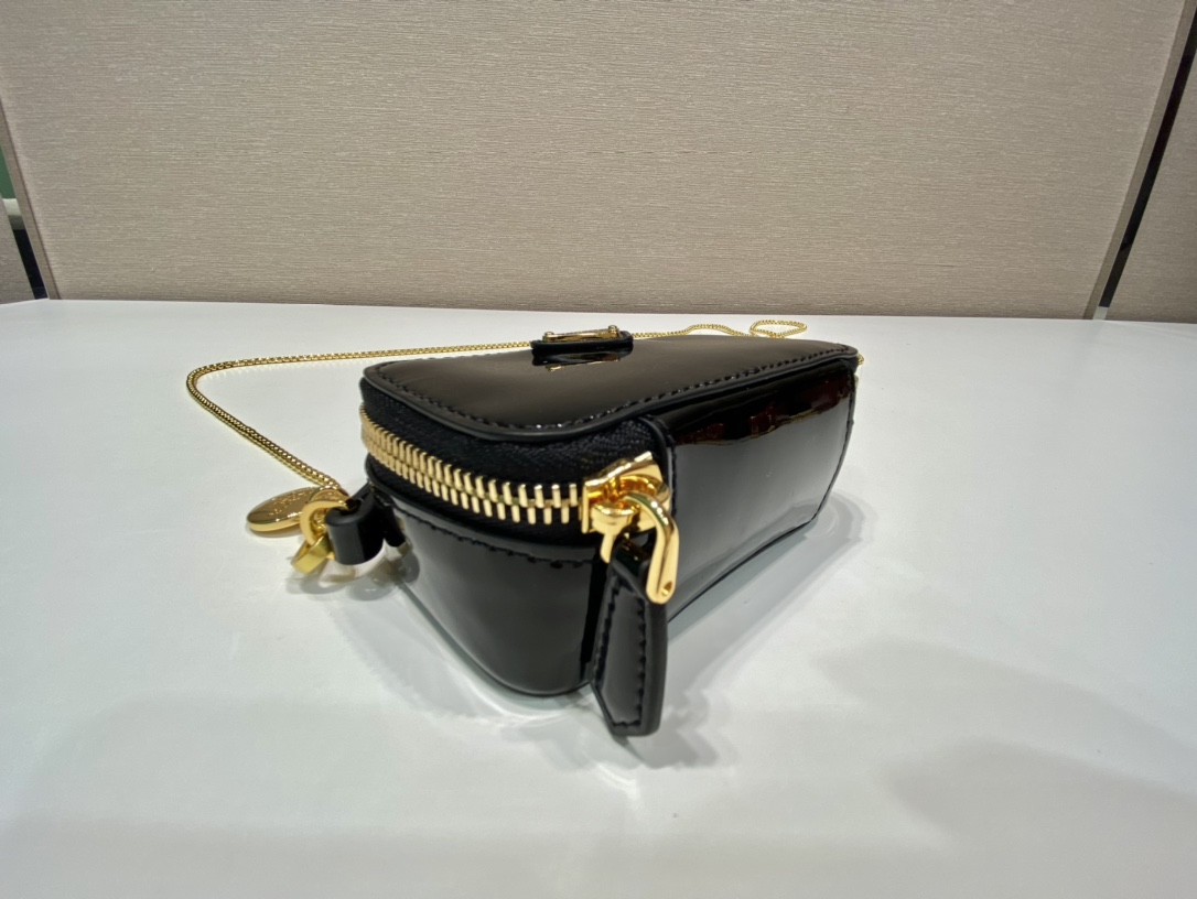 Pra*a patent leather mini-pouch